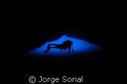My buddy Vicente floating in the blue from inside the Mor... by Jorge Sorial 